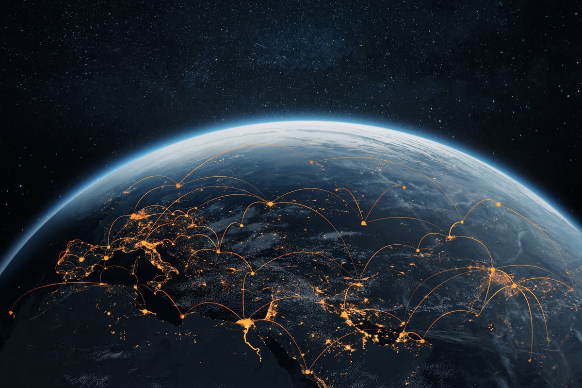 A world map with glowing connection lines, illustrating The Concierge's global network across Asia, Europe, and the Americas